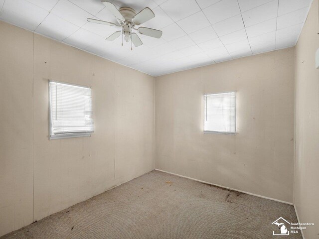 6405 Stillwater Ct, Erie, MI 48133 - carpeted empty room featuring a ceiling fan