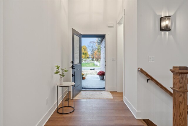 doorway to outside with hardwood / wood-style flooring