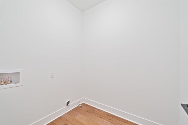 laundry room with gas dryer hookup, wood-type flooring, and hookup for a washing machine