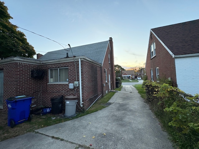 view of property exterior at dusk