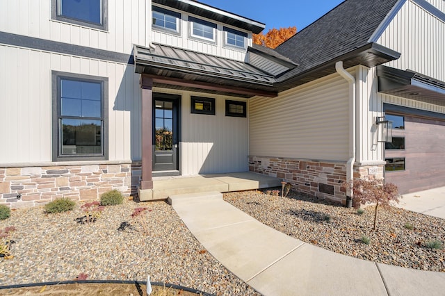 2680 Ashford Trl, Portage, MI 49024 - doorway to property with stone siding, a standing seam roof, metal roof, and a porch