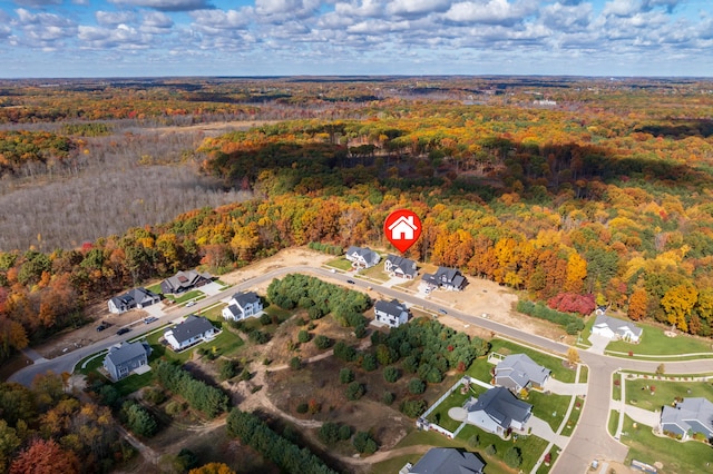 2680 Ashford Trl, Portage, MI 49024 - aerial view of property and surrounding area featuring a forest and nearby suburban area