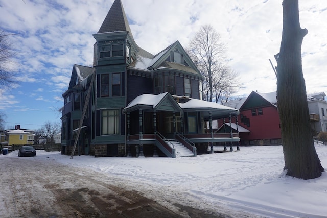 view of snow covered property