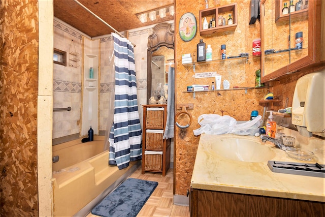 bathroom with backsplash, parquet floors, vanity, and shower / bath combo