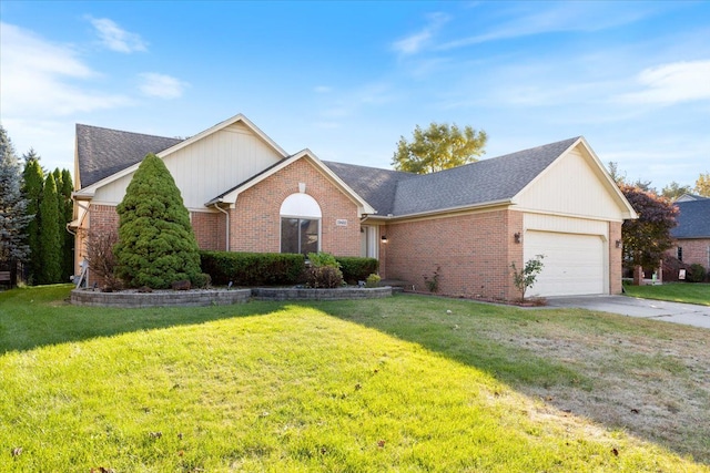 ranch-style house featuring a front lawn and a garage