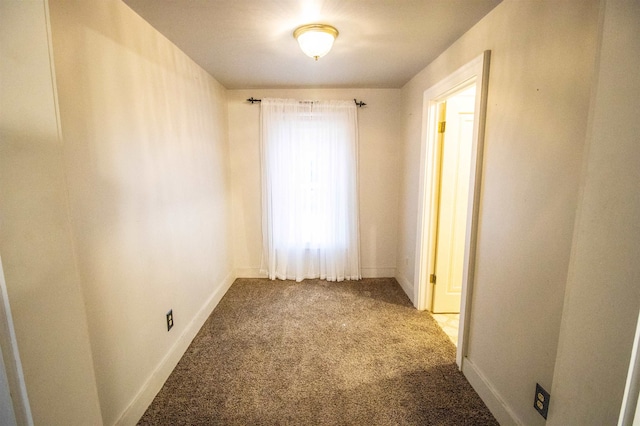 spare room featuring carpet flooring