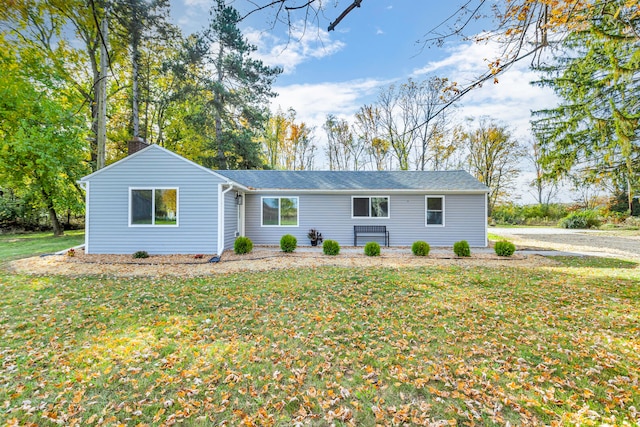 single story home with a front yard