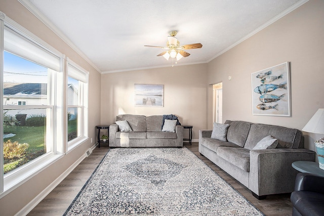 living room featuring dark hardwood / wood-style floors, ceiling fan, lofted ceiling, and crown molding