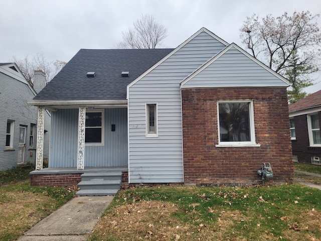 view of front of property featuring covered porch