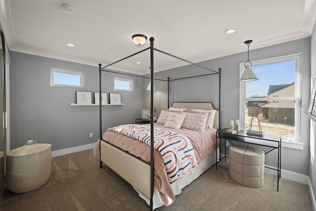 carpeted bedroom featuring multiple windows and ornamental molding