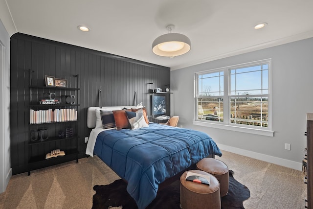 bedroom with carpet flooring and crown molding