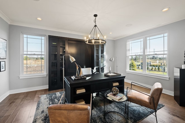 home office featuring hardwood / wood-style floors, a chandelier, and ornamental molding