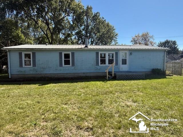 view of front of house with a front lawn