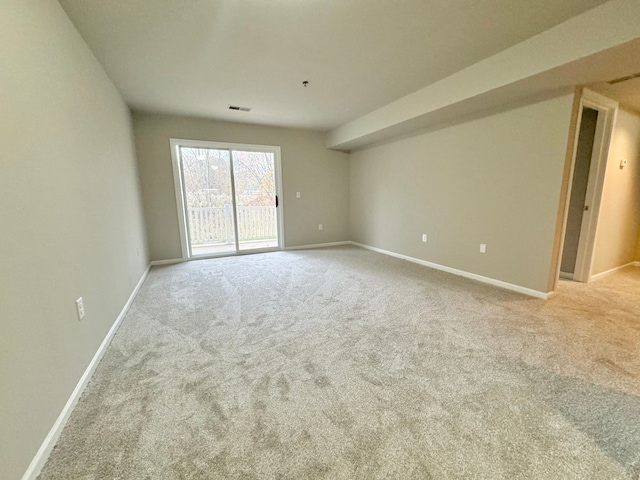 view of carpeted spare room