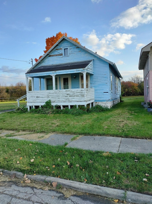 123 Eddington Ave, Flint, MI 48503 - view of front of property featuring a front lawn and covered porch