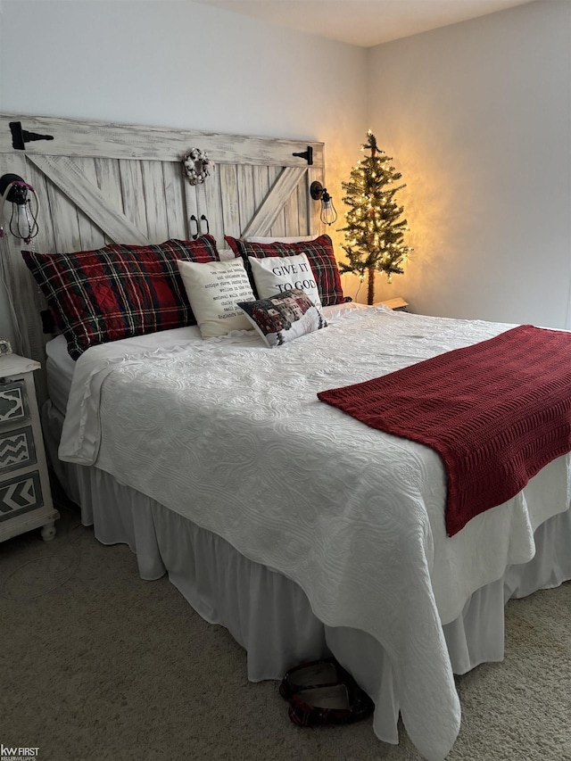 bedroom featuring carpet