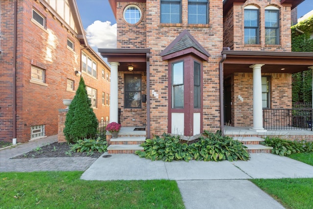 doorway to property with a porch