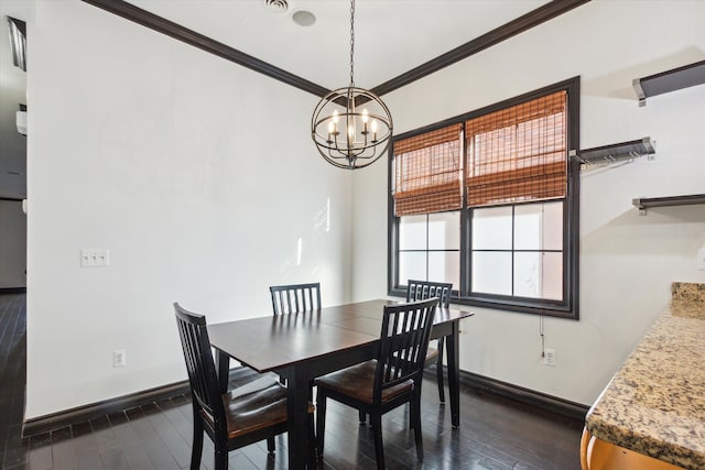 dining space with dark hardwood / wood-style floors, crown molding, and a notable chandelier