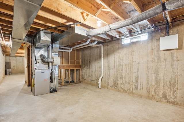 basement featuring heating unit