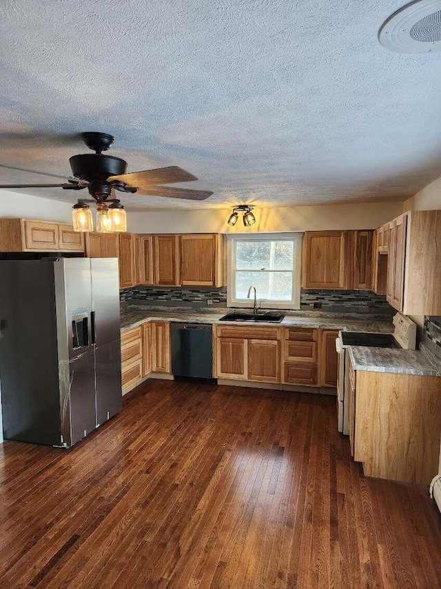 kitchen featuring sink, black dishwasher, stainless steel fridge with ice dispenser, dark hardwood / wood-style flooring, and range