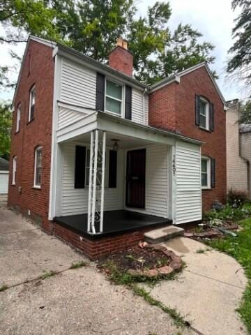 back of house with a porch