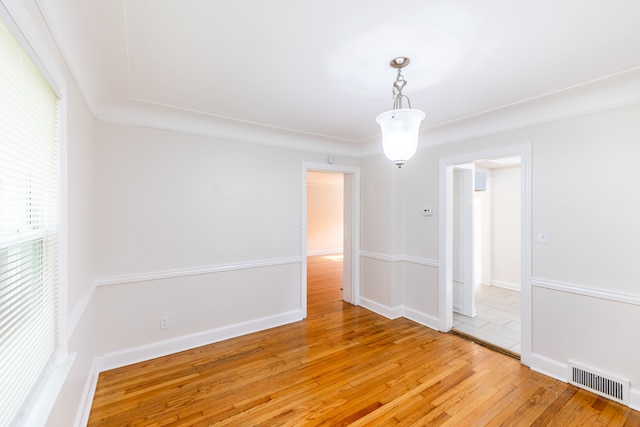 empty room featuring wood-type flooring