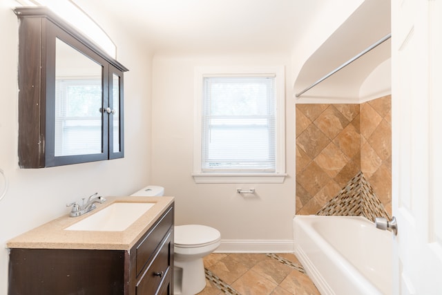 full bathroom with tile patterned flooring, vanity, toilet, and  shower combination