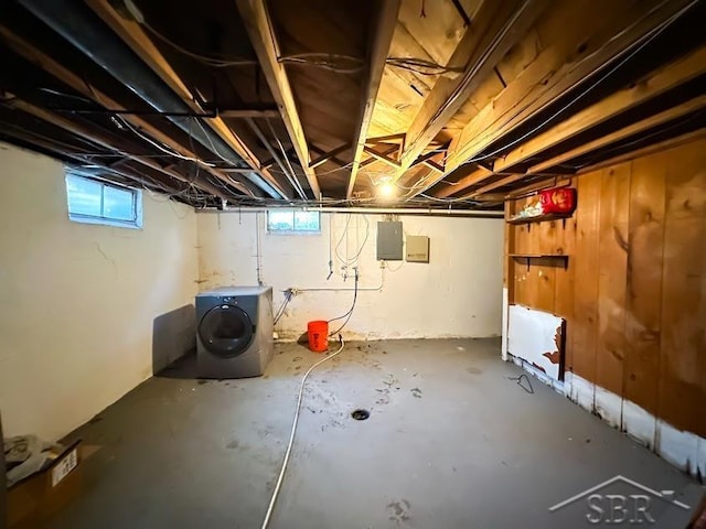 basement featuring washer / dryer and electric panel