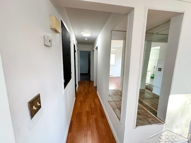 hall featuring hardwood / wood-style flooring