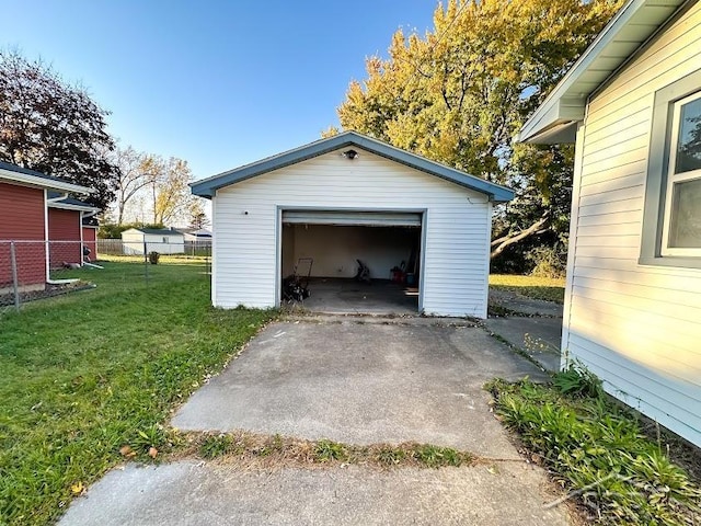 garage with a lawn