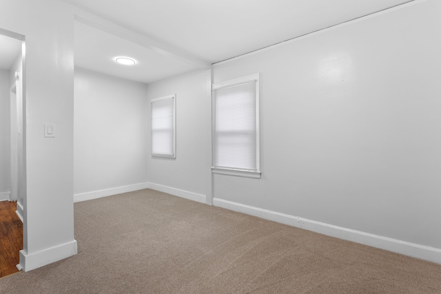 empty room featuring carpet flooring