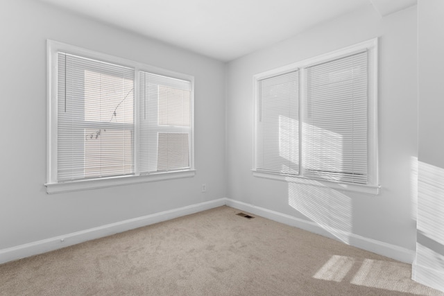 view of carpeted spare room