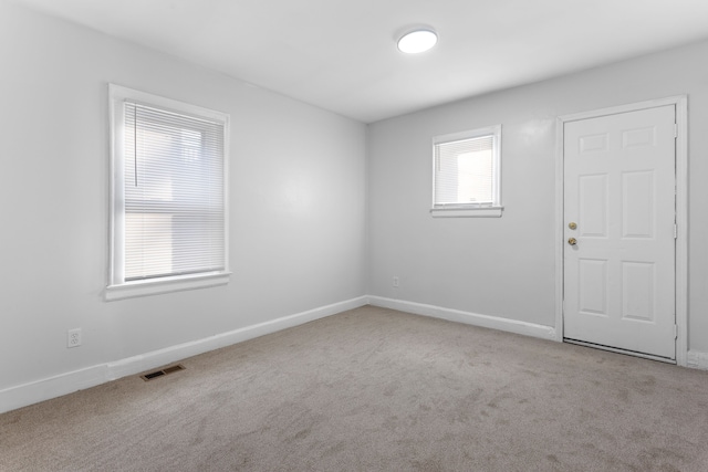 empty room with light carpet