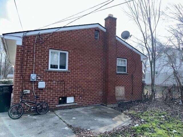 view of home's exterior with a patio area