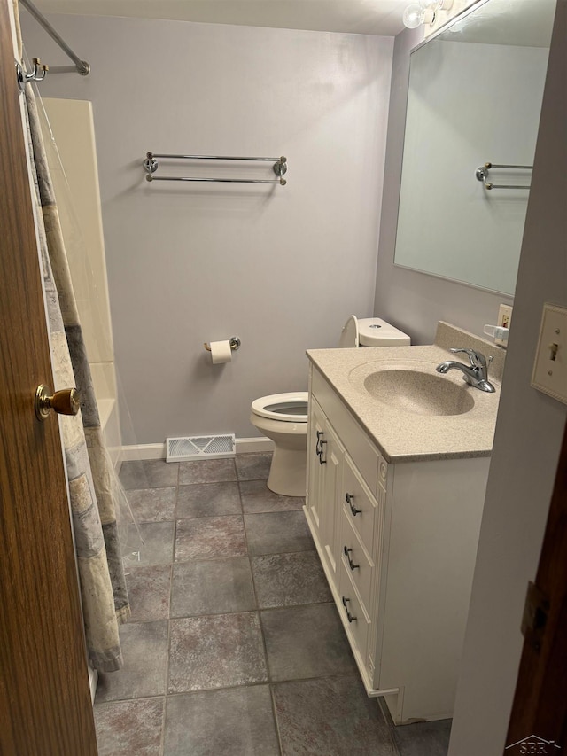 full bathroom featuring vanity, toilet, and shower / bath combination