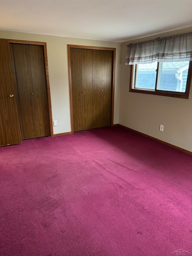 unfurnished bedroom featuring carpet floors