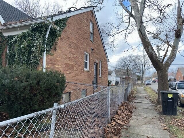 17401 W Albion St W, Detroit, MI 48234 - view of side of home with brick siding