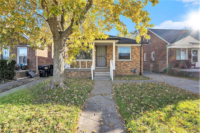 view of front of home with a front lawn