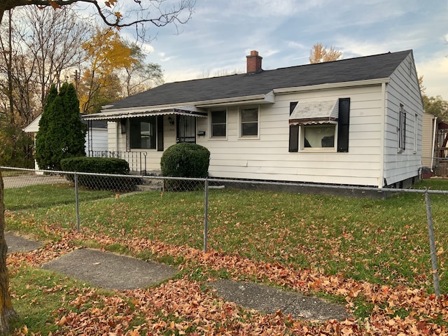 view of front of home with a front yard