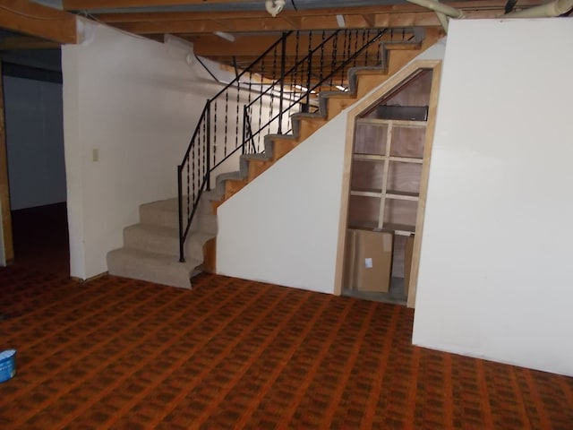 1164 Mary Jane Cir, Caro, MI 48723 - below grade area with stairs and carpet floors
