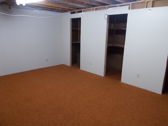 basement with carpet floors