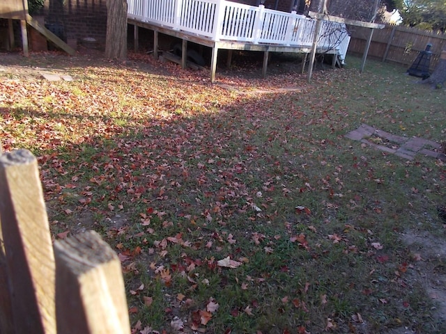 1164 Mary Jane Cir, Caro, MI 48723 - view of yard featuring a deck and fence