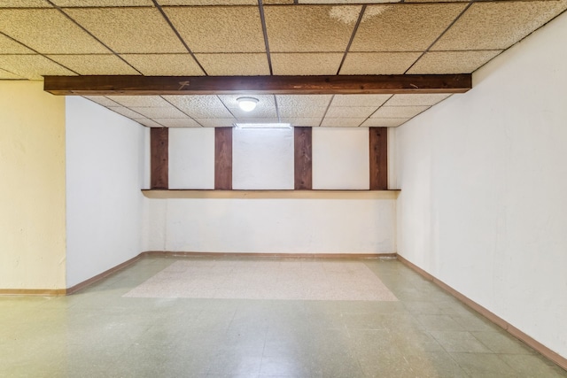 basement featuring a drop ceiling