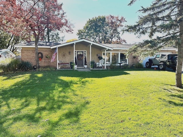 ranch-style house with a front lawn