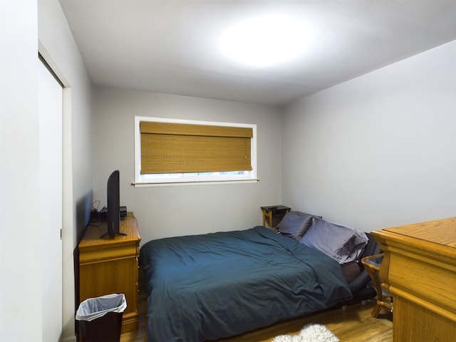 bedroom featuring hardwood / wood-style floors