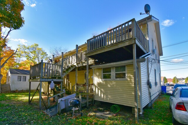 221 N 6th St, Niles, MI 49120 - rear view of house with a wooden deck and stairs