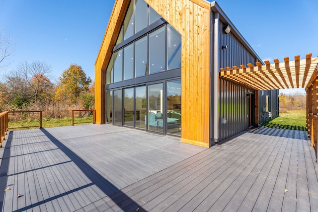 wooden deck with a pergola