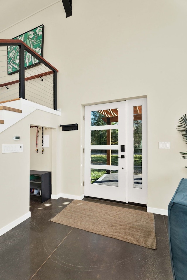 doorway featuring a high ceiling