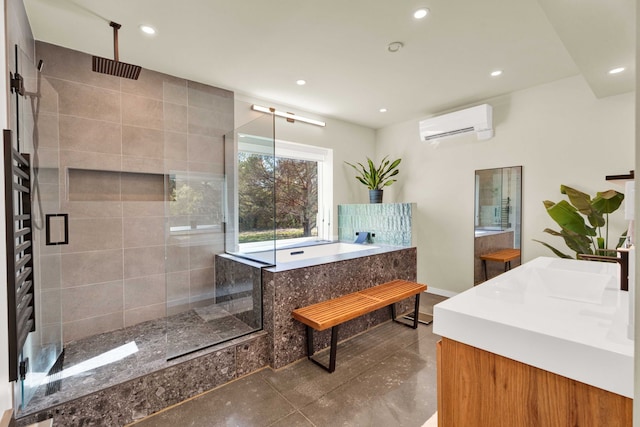 bathroom featuring vanity, independent shower and bath, and a wall unit AC