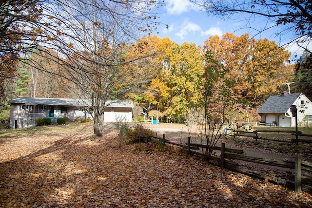 view of yard featuring a garage